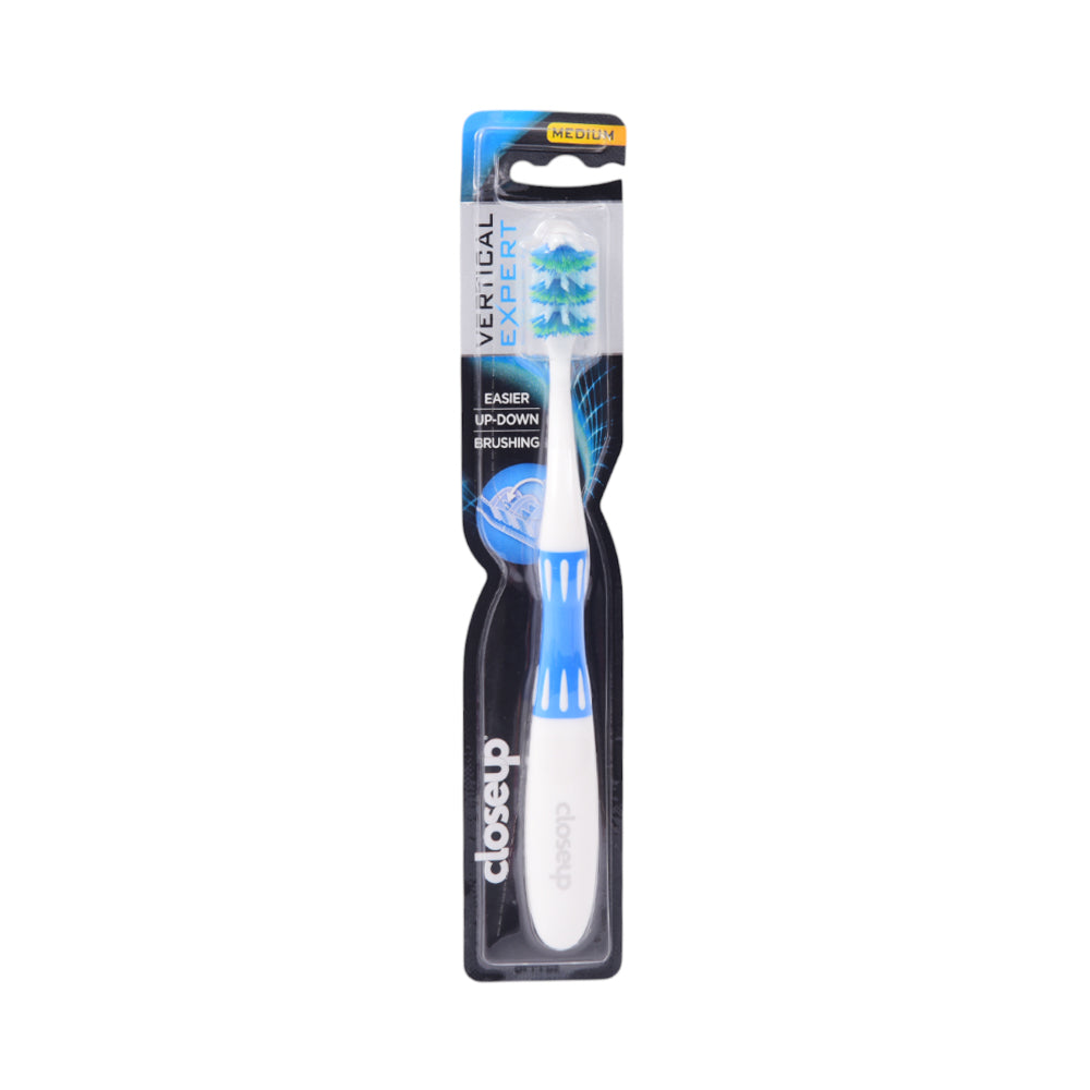 CLOSEUP TOOTH BRUSH VERTICAL EXPERT MEDIUM